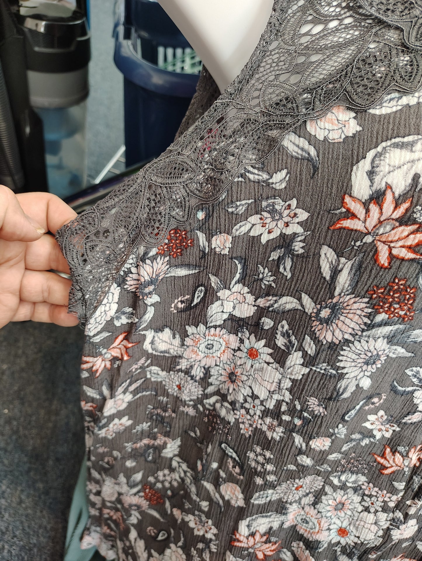 Torrid sharkbite hem floral and lace dressy top 1x