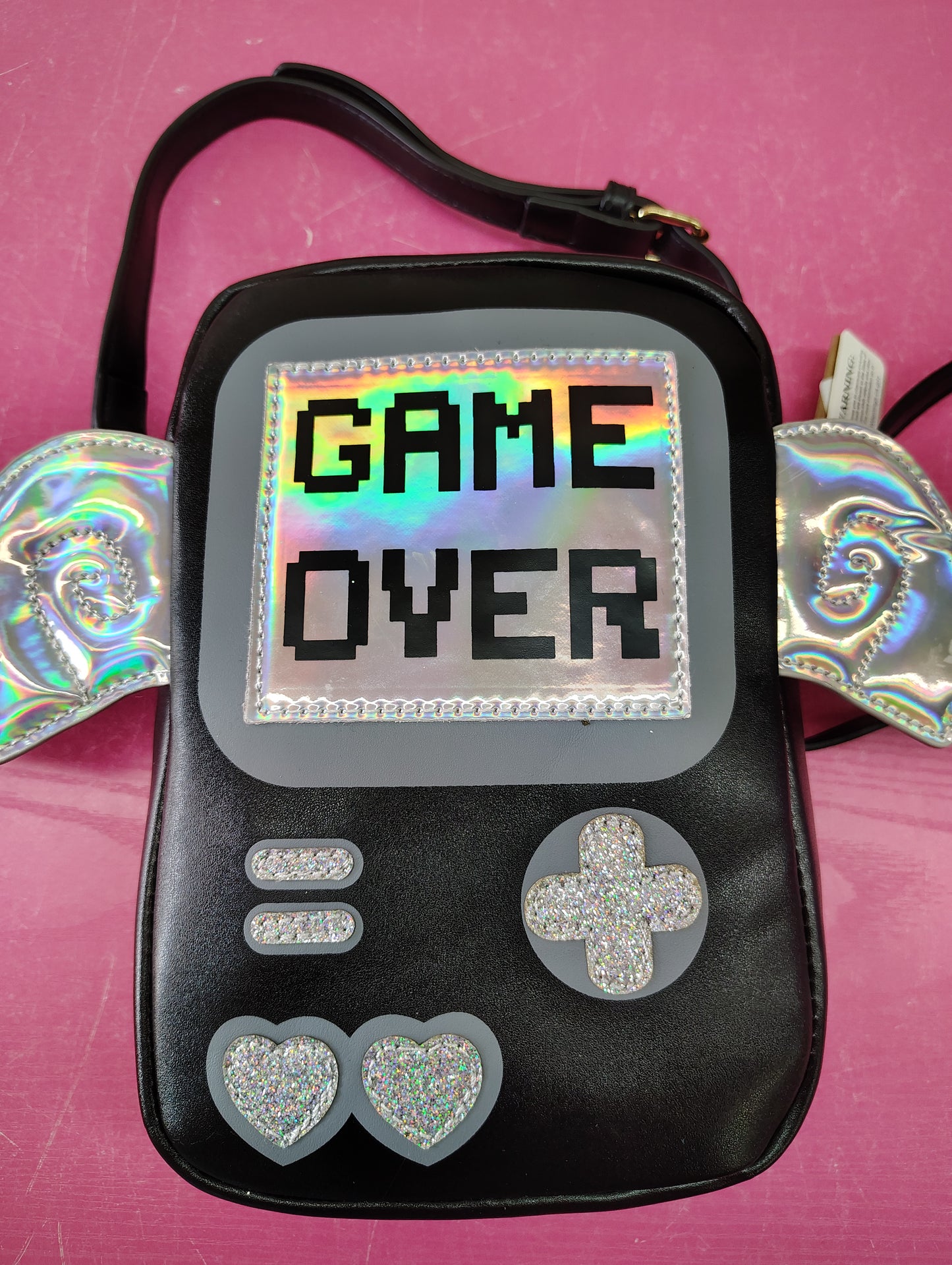 New "Game Over" black crossbody bag with wings